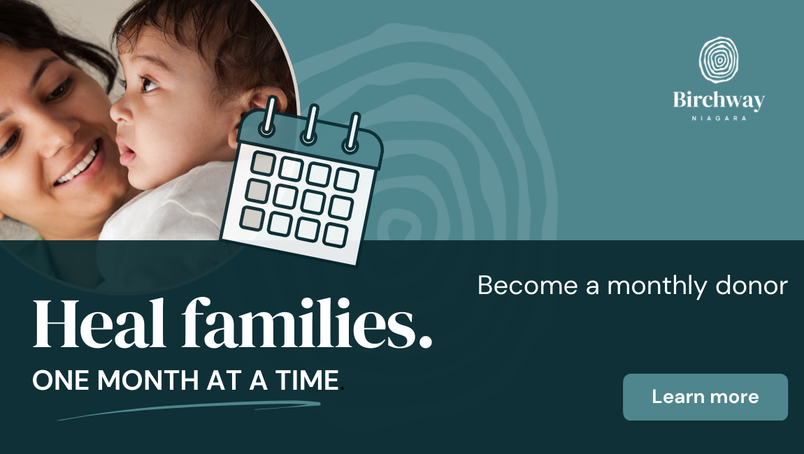 Women holds her infant. Graphic over image is of a stylized one-month calendar. Text: Heal Families. One month at a time. Become a monthly donor. Button says learn more - click anywhere on image to go to monthly donation page).